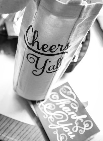 Wedding photography, a wine bag that says, "Cheers Y'all"