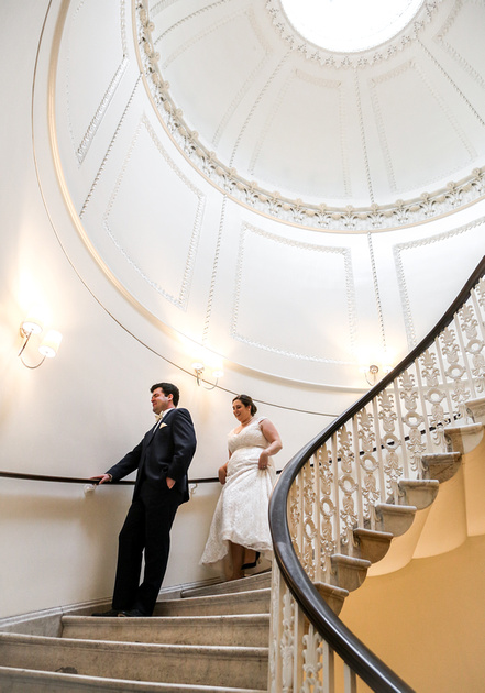 Wedding photography, a bride walk towards her groom on a epic staircase. 