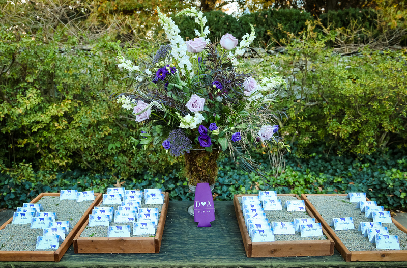 Wedding photography, the table place cards laying in displays of lavender. 